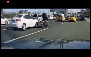 Dude On A Motorbike Knocks Off A Car's Mirror, Gets Some Instant Karma