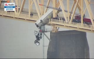 Insane Footage Shows A Dramatic Rescue Of A Semi Hanging Over A Bridge