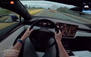Dude Does Over 200 MPH In A Tesla Plaid S On The Autobahn And It's INSANE
