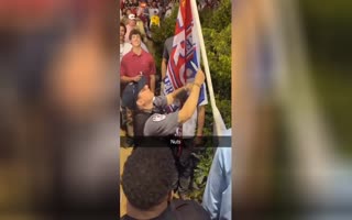 WTH? University Of Arkansas Police Cut Down Aa Pro-Trump Flag At The Ole Miss Baseball Game