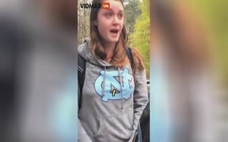 Triggered Liberal Chick Steals Protest Sign On College Campus, Shocked When Cop Comes To Haul Her To Jail
